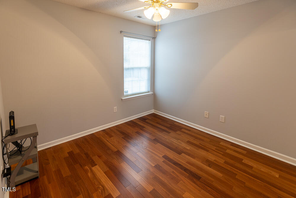 5420 Golden Moss Trail Raleigh, NC 27613 - Photo 18 of 33 wooden floor in an empty room