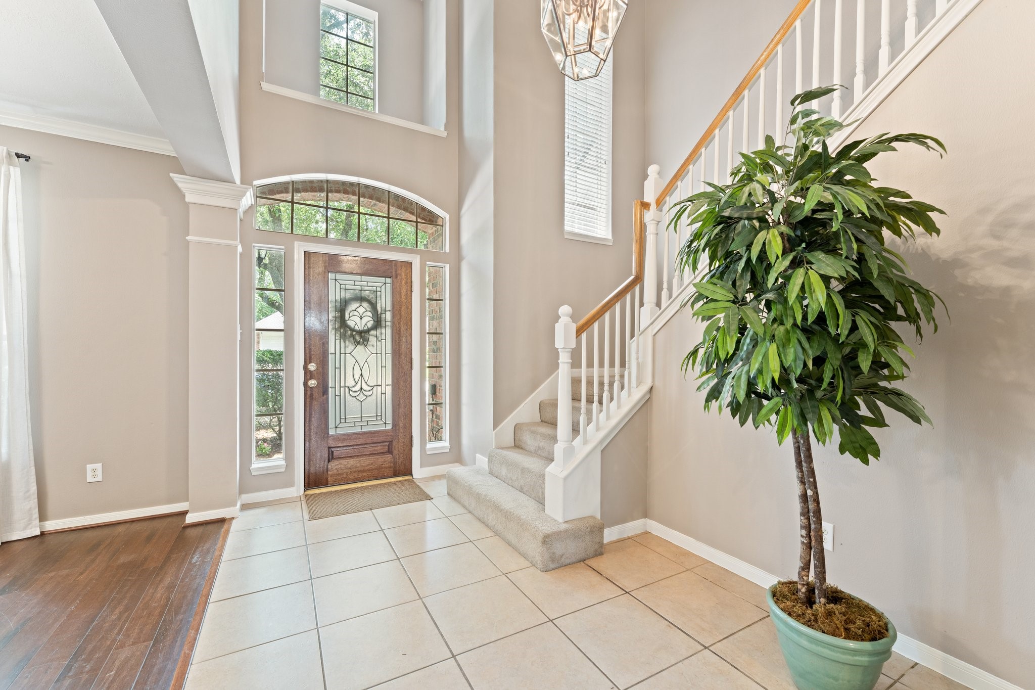 25447 China Springs Spring, TX 77373 - Photo 6 of 45 Two story ceilings and an abundance of natural sunlight make the space feel grand and bright.