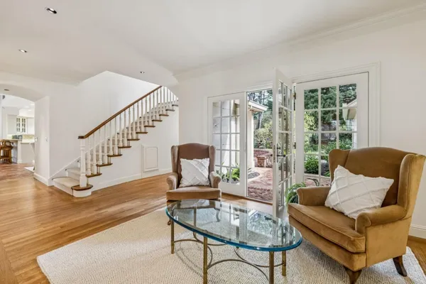 a living room with furniture and a table