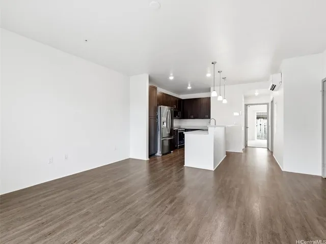a view of a kitchen with a microwave and a stove