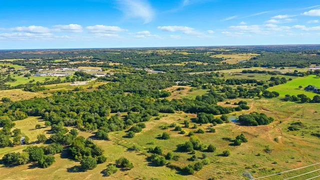 a view of a yard with an outdoor space