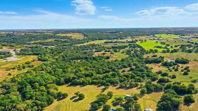 a view of a lake from a yard