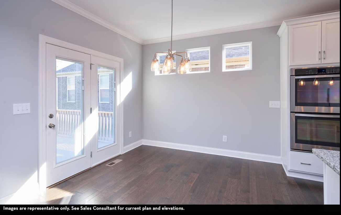 7914 Pine Street Fairview, TN 37062 - Photo 15 of 22 a view of a livingroom with furniture wooden floor and window