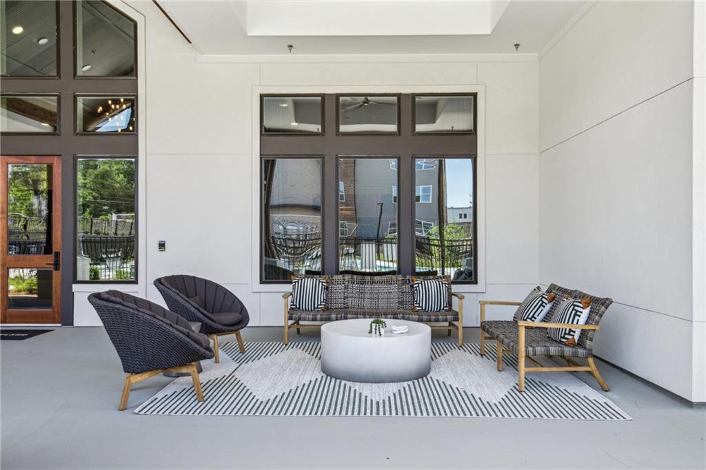 1296 Moreland Avenue Southeast, Unit 12101 Atlanta, GA 30316 - Photo 11 of 15 a living room with furniture and a window