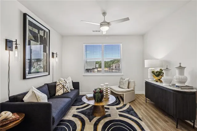 a living room with furniture and window