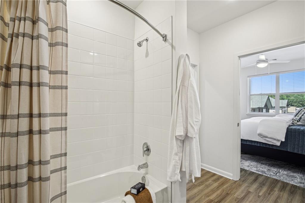 1296 Moreland Avenue Southeast, Unit 12101 Atlanta, GA 30316 - Photo 5 of 15 a bathroom with a sink and a shower