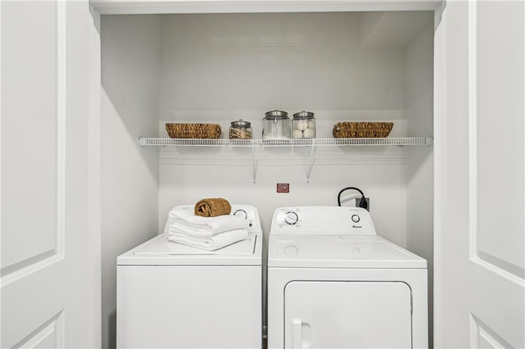 1296 Moreland Avenue Southeast, Unit 12101 Atlanta, GA 30316 - Photo 6 of 15 a utility room with dryer and washer