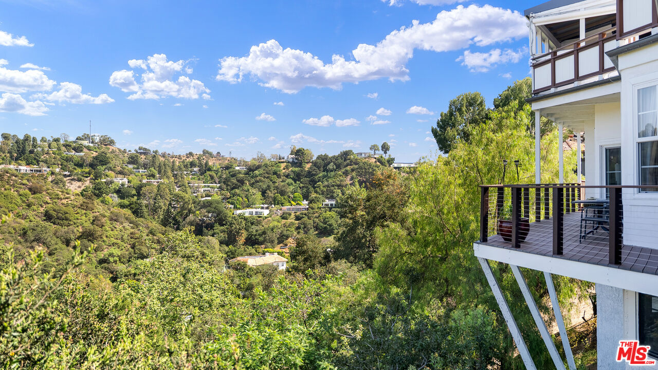 2312 Kimridge Road Beverly Hills, CA 90210 - Photo 52 of 60 a view of a balcony with an outdoor space