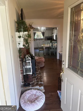 a kitchen with stainless steel appliances granite countertop a refrigerator and a stove