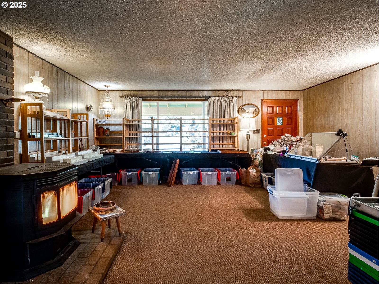 21340 Southwest Tile Flat Road Beaverton, OR 97007 - Photo 5 of 46 a living room filled with furniture and a large window