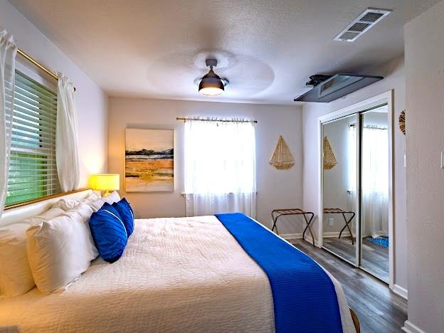 1017 Airport Road Graford, TX 76449 - Photo 19 of 32 a bedroom with a bed and window