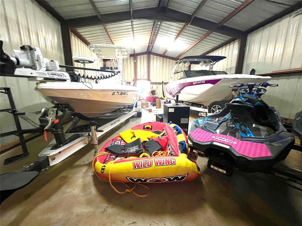1017 Airport Road Graford, TX 76449 - Photo 28 of 32 a bedroom with bed and a window