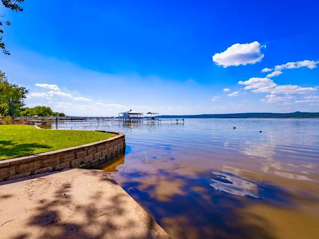 1017 Airport Road Graford, TX 76449 - Photo 30 of 32 a view of a room with a table and chairs