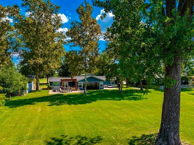 1017 Airport Road Graford, TX 76449 - Photo 3 of 32 a view of a house with a big yard