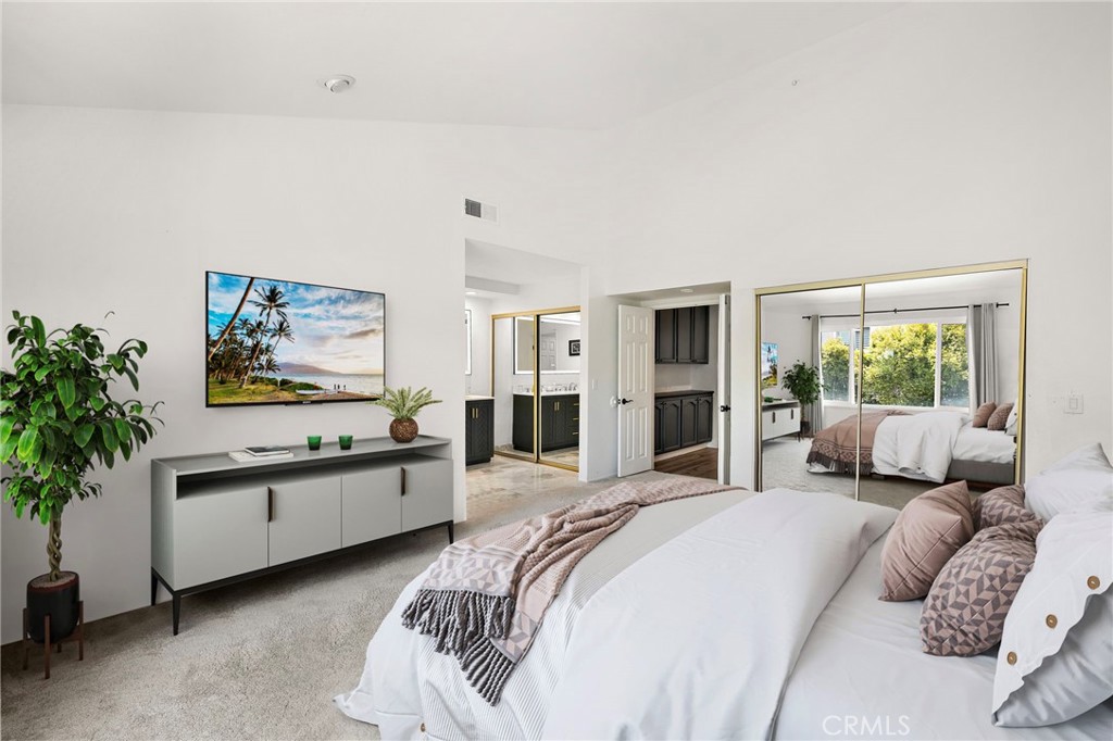 522 Calle Cuadra San Clemente, CA 92673 - Photo 21 of 37 a spacious bedroom with a large bed and a balcony