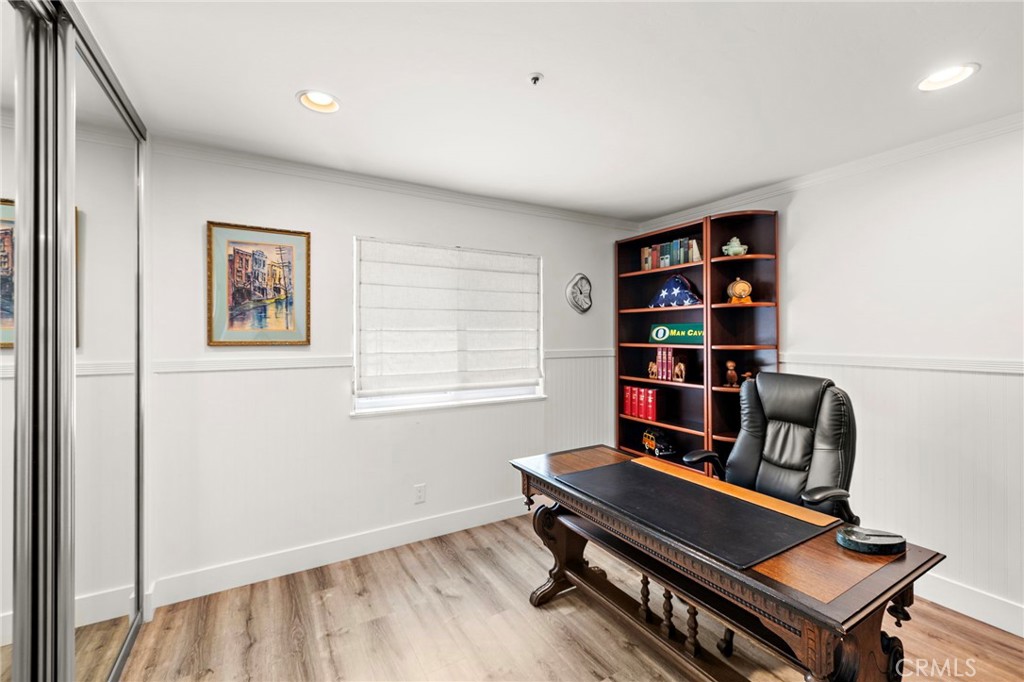 522 Calle Cuadra San Clemente, CA 92673 - Photo 26 of 37 a view of a workspace with furniture and a bookshelf