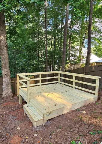 a view of a swimming pool with chairs