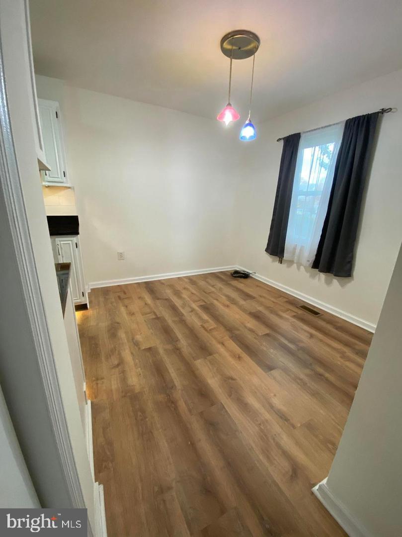 14 Vienna Court Frederick, MD 21702 - Photo 3 of 9 a view of an empty room with a mirror