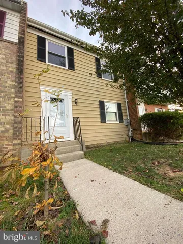 a view of a backyard of the house