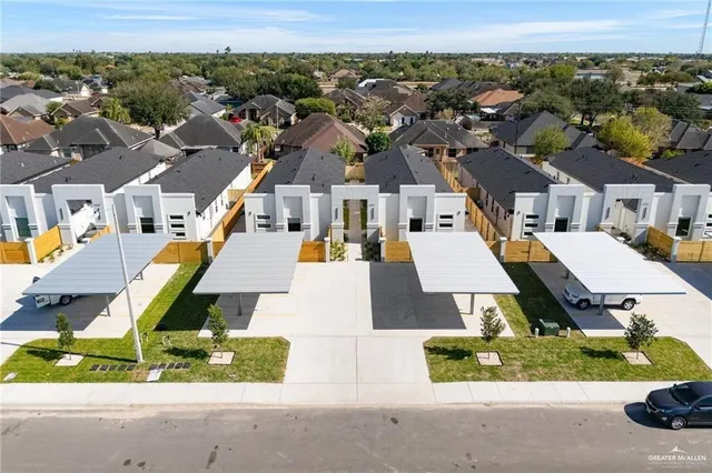 an aerial view of a house with a garden