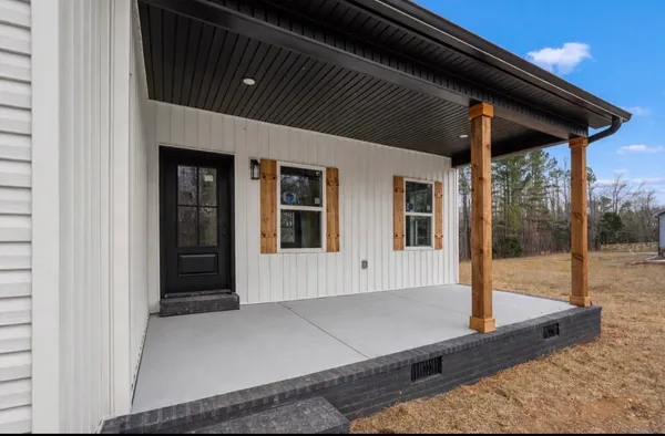 a porch with seating space