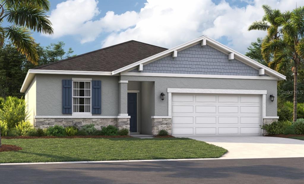 1256 Blue Daze Lane Eustis, FL 32726 - Photo 1 of 1 a front view of a house with a garden