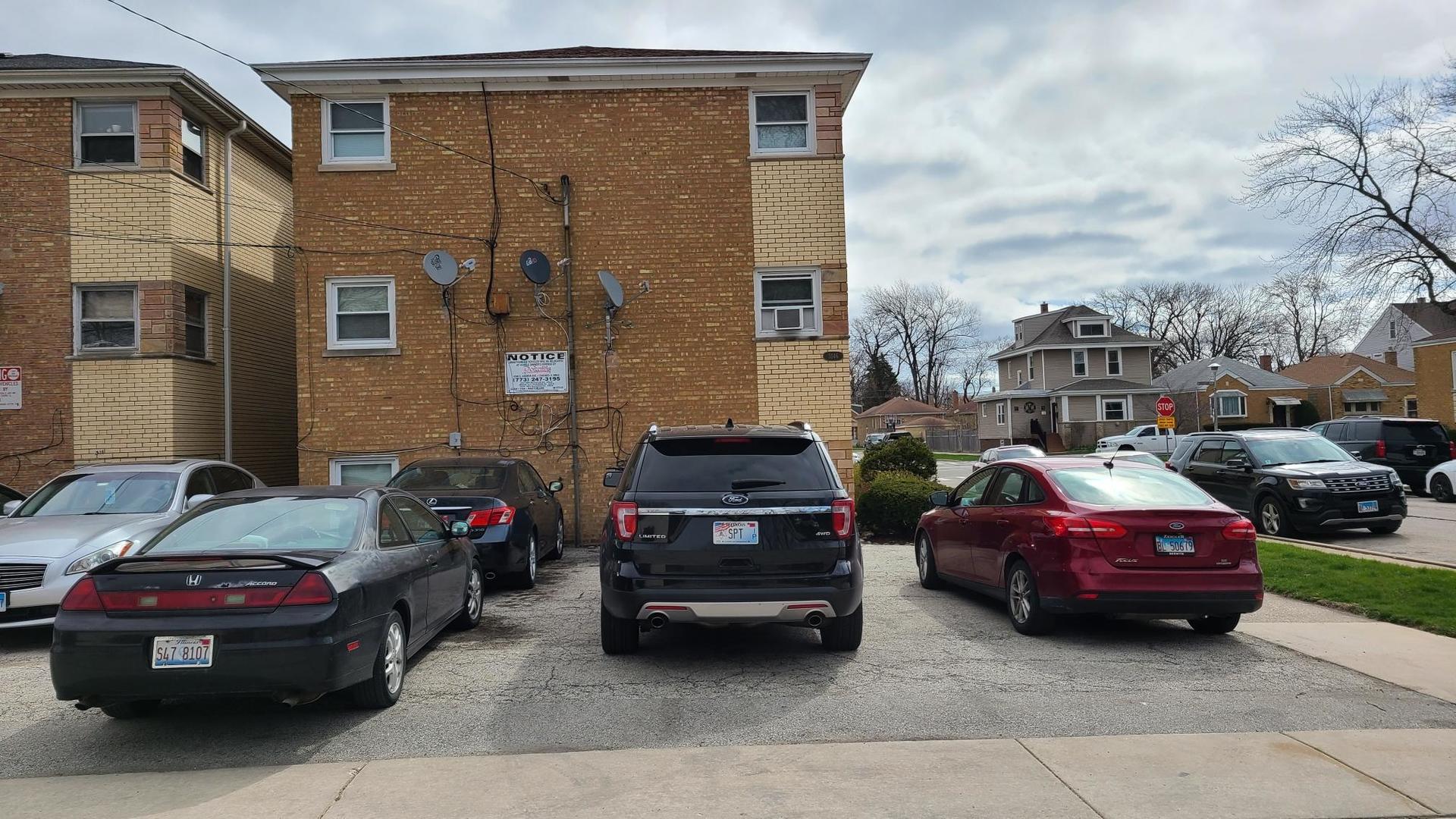 3146 Ridgeland Avenue, Unit 3W Berwyn, IL 60402 - Photo 16 of 16 a car parked in front of a house