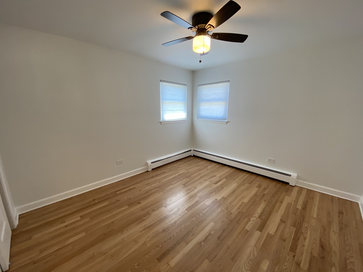3146 Ridgeland Avenue, Unit 3W Berwyn, IL 60402 - Photo 5 of 16 wooden floor in an empty room