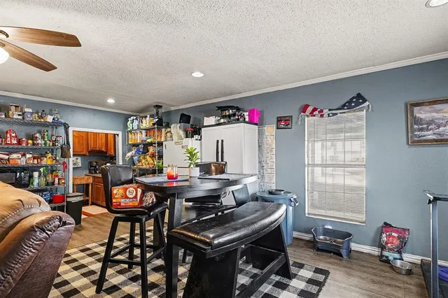 a view of a livingroom with furniture and toys