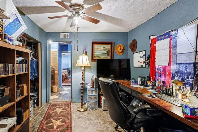 a room with furniture and flat screen tv