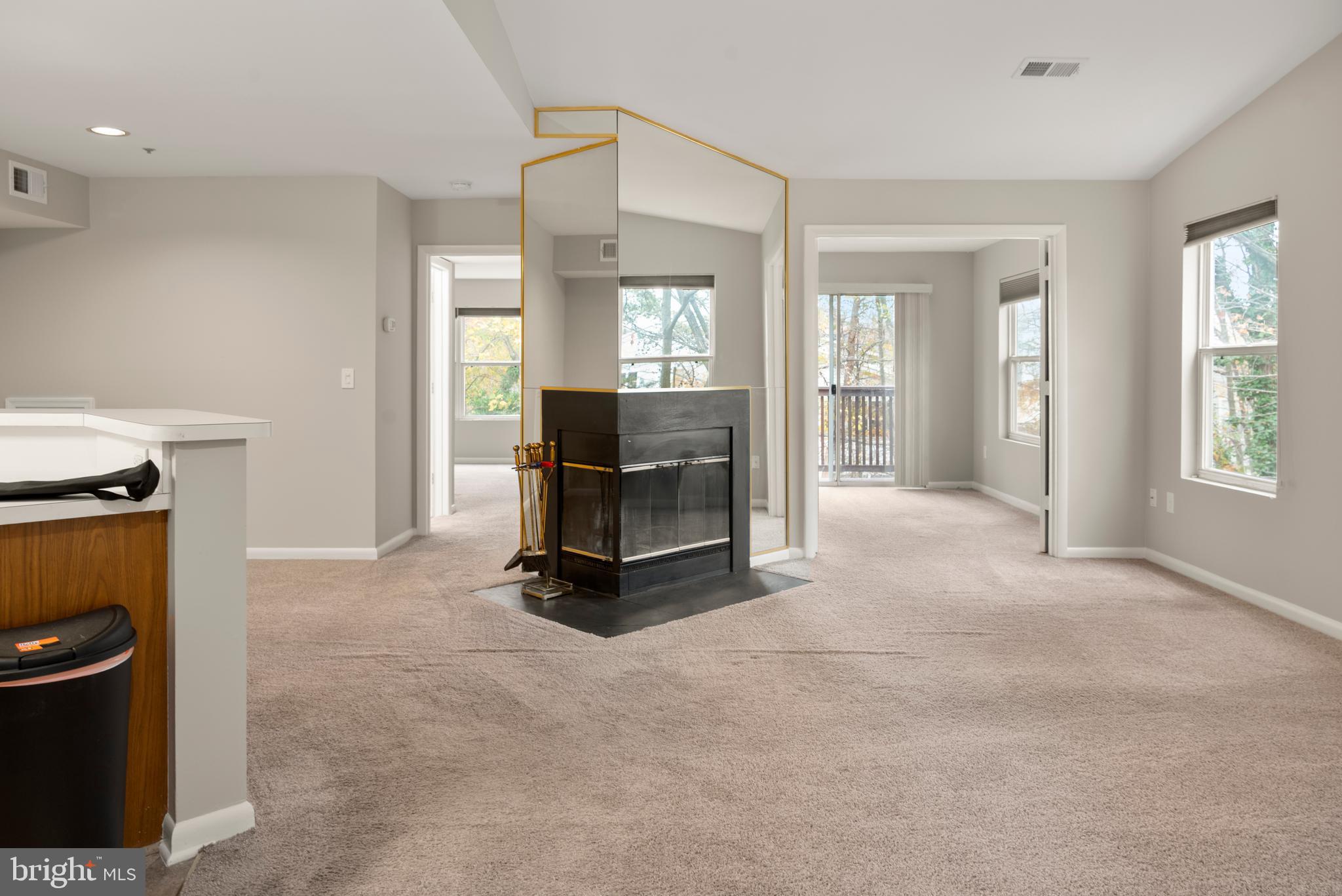 10 L Amberstone Court, Unit L Annapolis, MD 21403 - Photo 12 of 25 a view of a livingroom with furniture and a window
