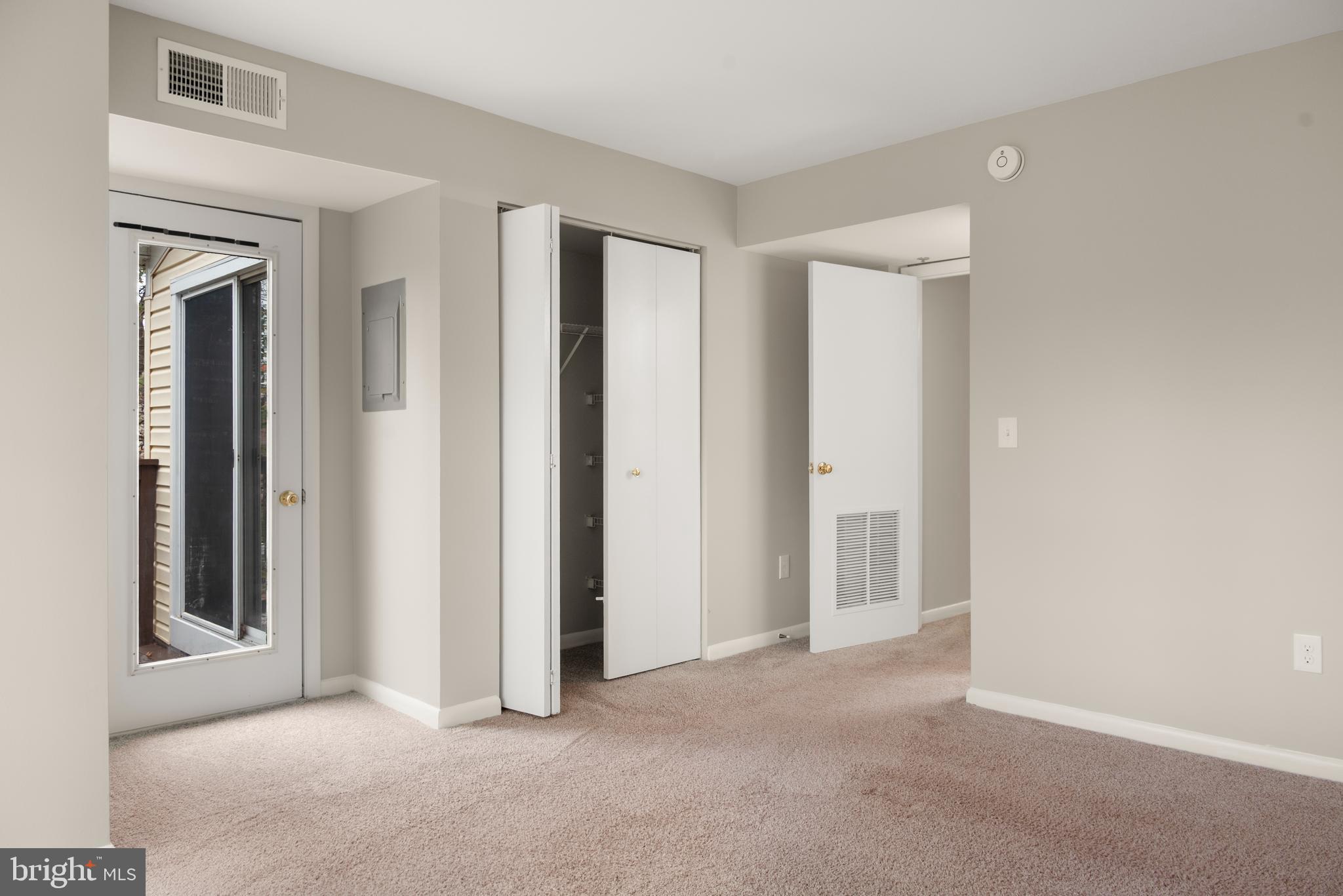 10 L Amberstone Court, Unit L Annapolis, MD 21403 - Photo 15 of 25 an empty room with windows