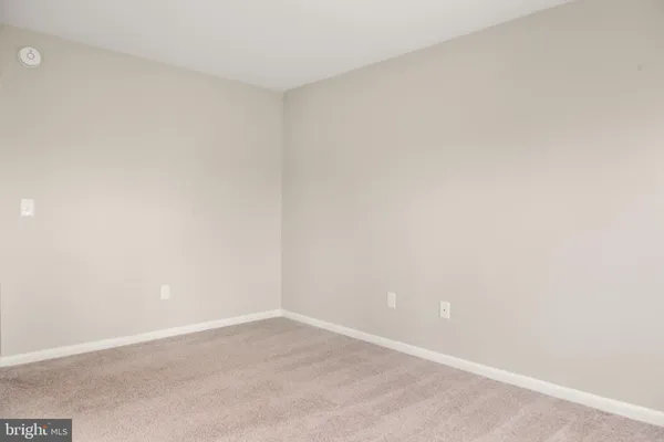 a bathroom with a shower and a toilet