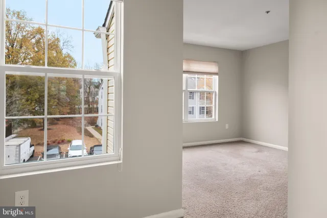 a view of livingroom with windows