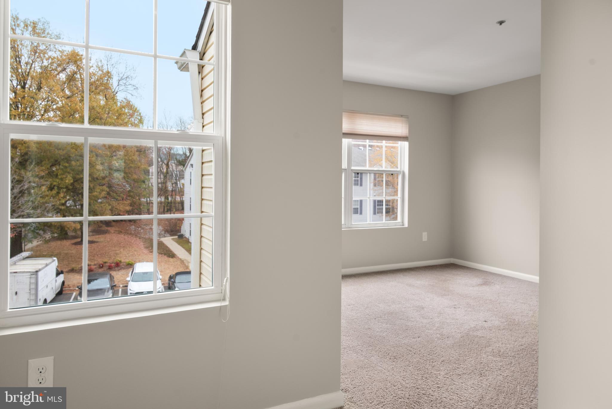 10 L Amberstone Court, Unit L Annapolis, MD 21403 - Photo 19 of 25 an empty room with a window