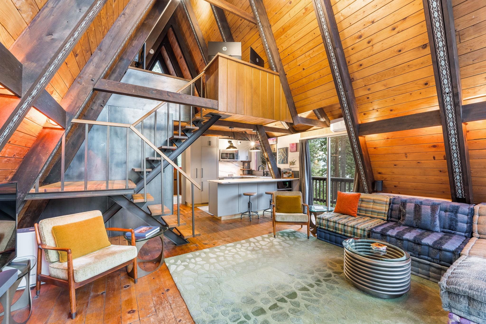 4285 Jeffrey Way Carnelian Bay, CA 96140 - Photo 6 of 21 a backyard of a house with barbeque oven table and chairs