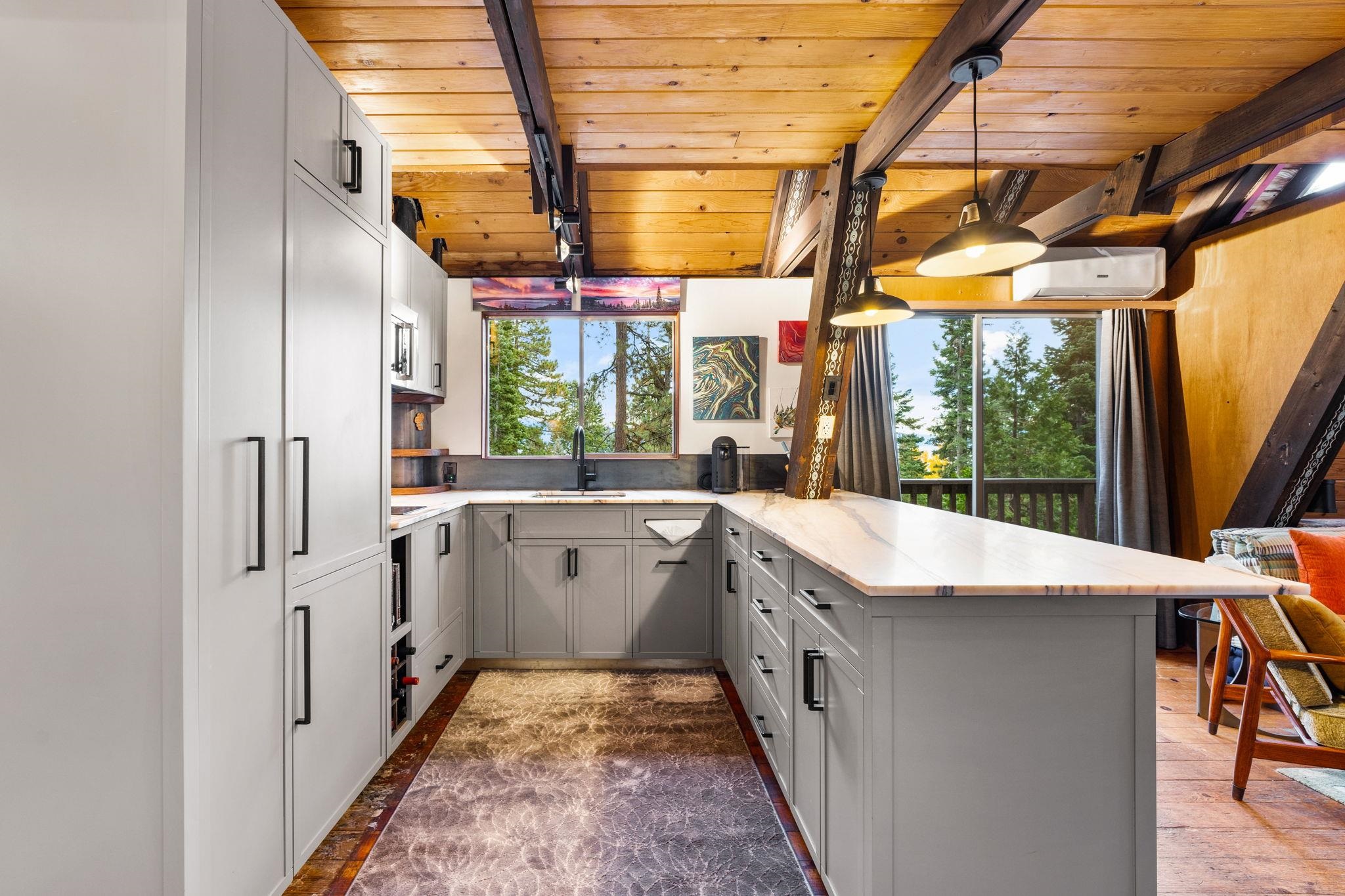 4285 Jeffrey Way Carnelian Bay, CA 96140 - Photo 7 of 21 a very nice looking room with a large window