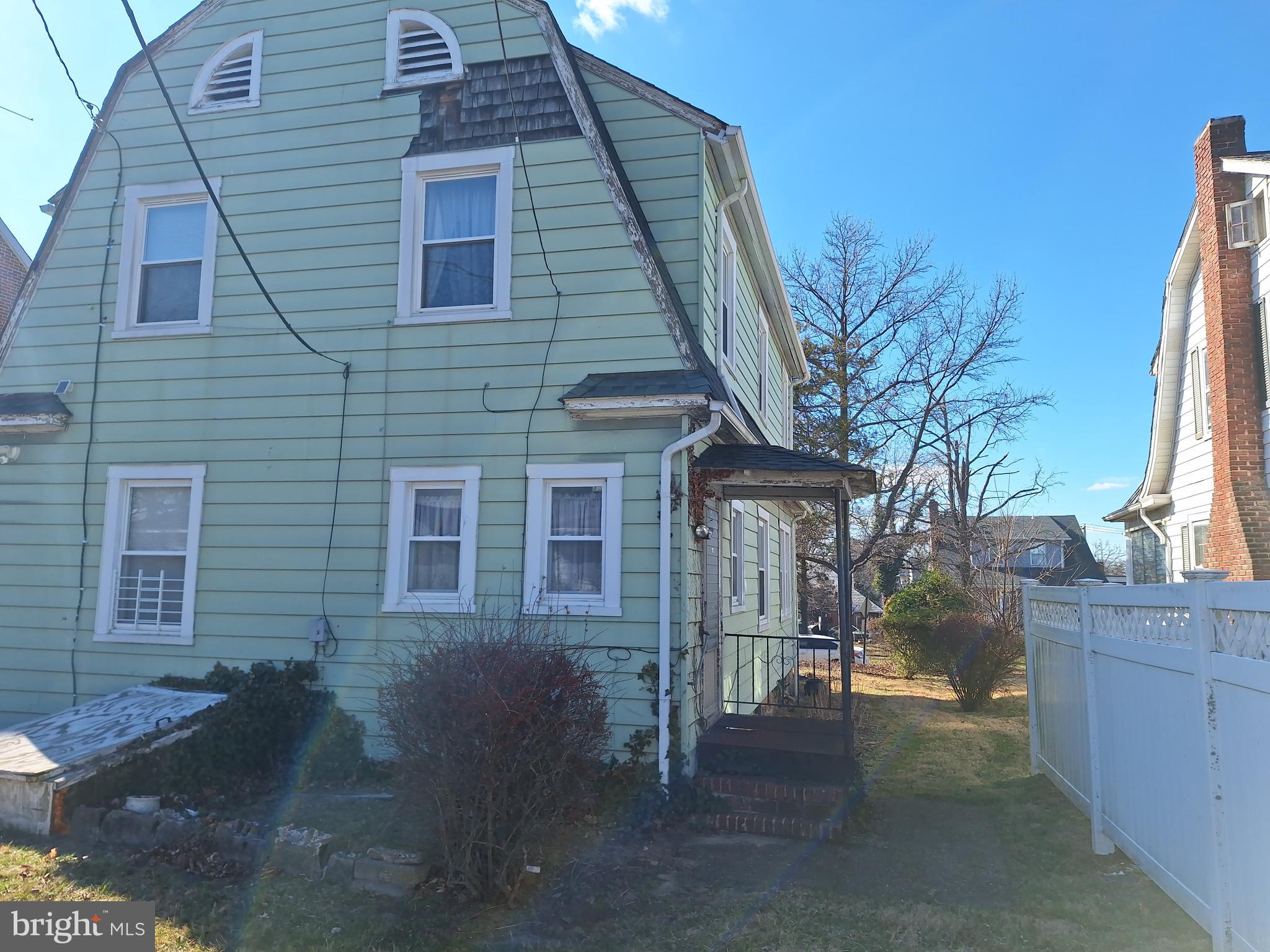 3803 Cedardale Road Baltimore, MD 21215 - Photo 13 of 56 a view of a house with a patio