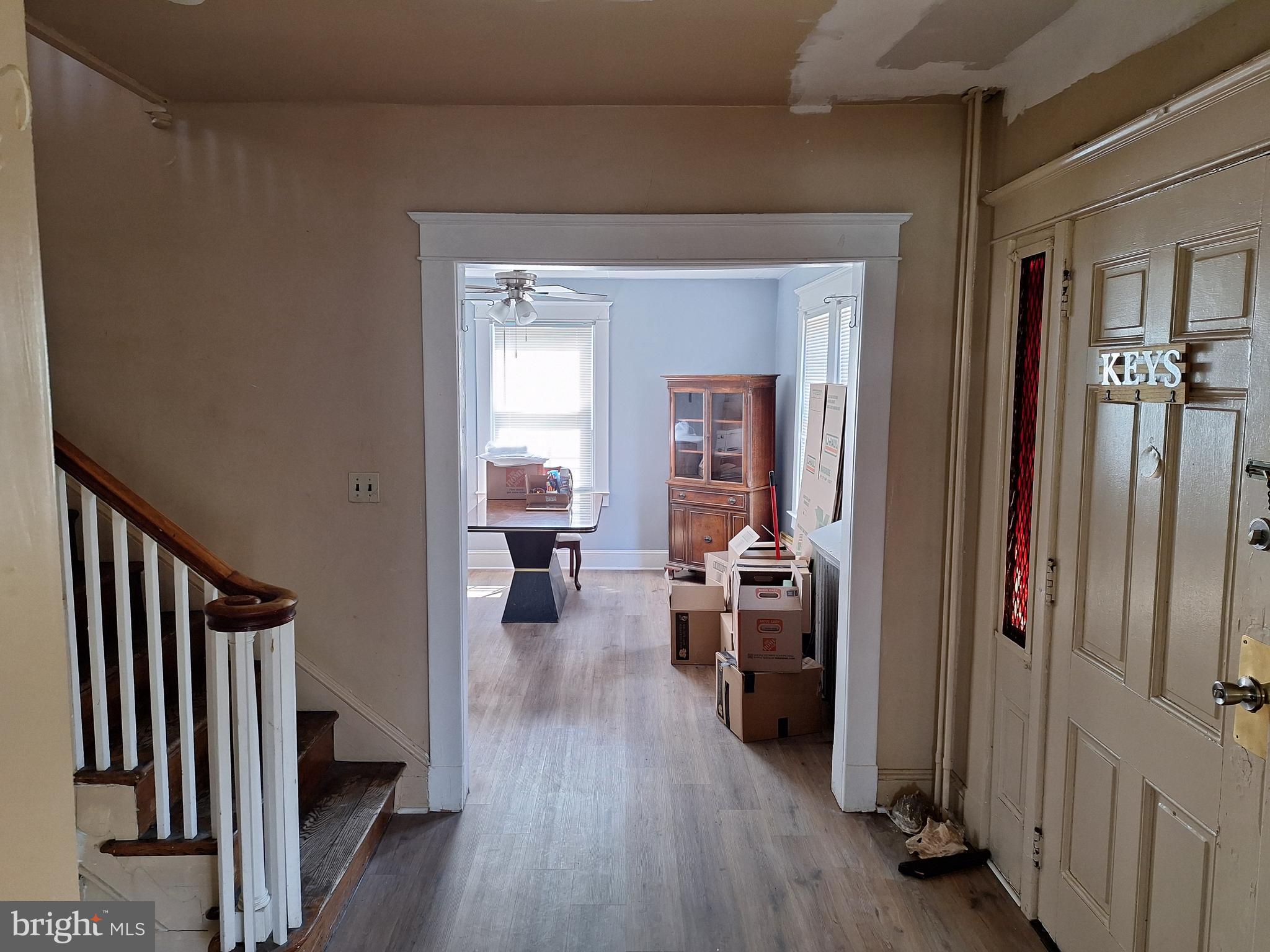 3803 Cedardale Road Baltimore, MD 21215 - Photo 19 of 56 a view of a livingroom with wooden floor and furniture