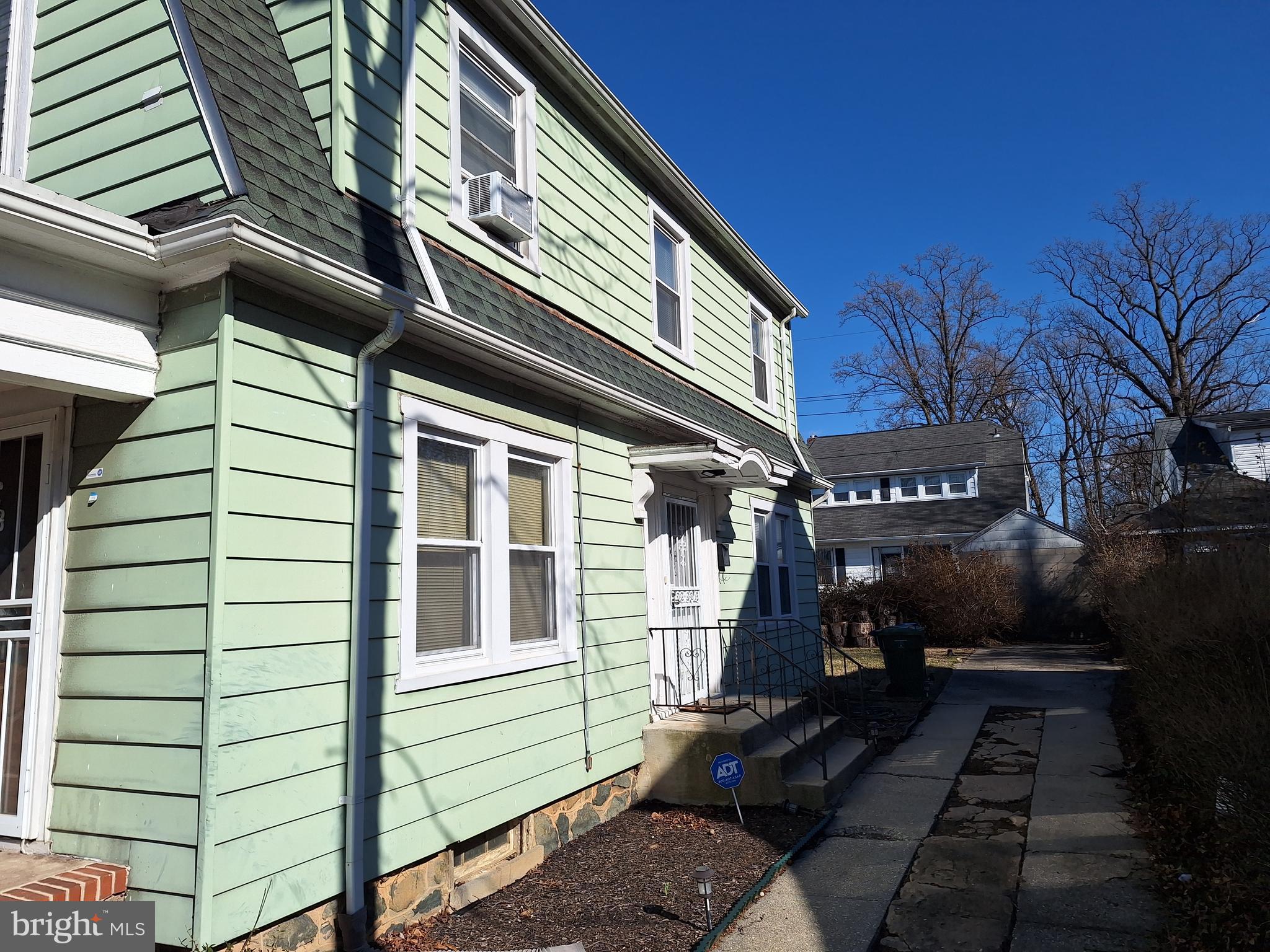 3803 Cedardale Road Baltimore, MD 21215 - Photo 9 of 56 a front view of a house