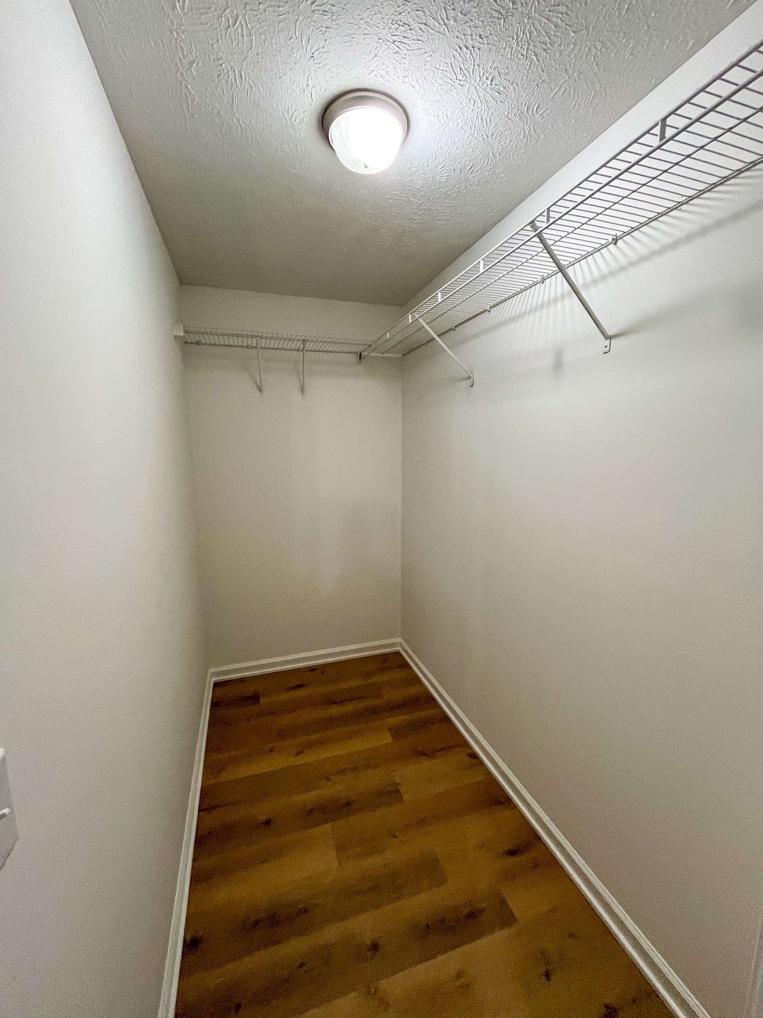 1905 Highway 259 Portland, TN 37148 - Photo 15 of 20 a view of a room with racks on the wall