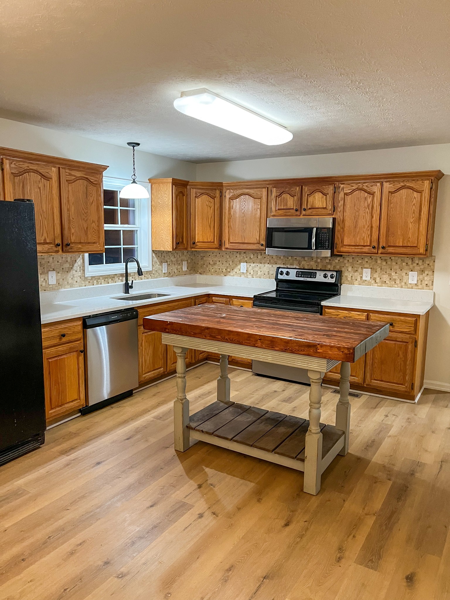 1905 Highway 259 Portland, TN 37148 - Photo 8 of 20 a kitchen with a sink appliances and cabinets