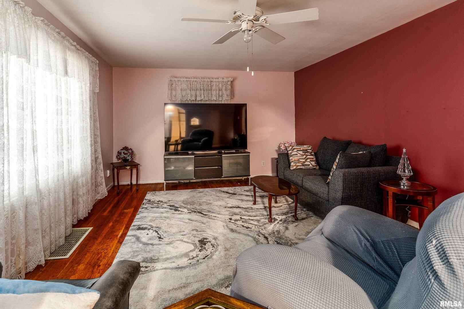 2320 McCord Street Murphysboro, IL 62966 - Photo 7 of 27 a living room with furniture and a flat screen tv