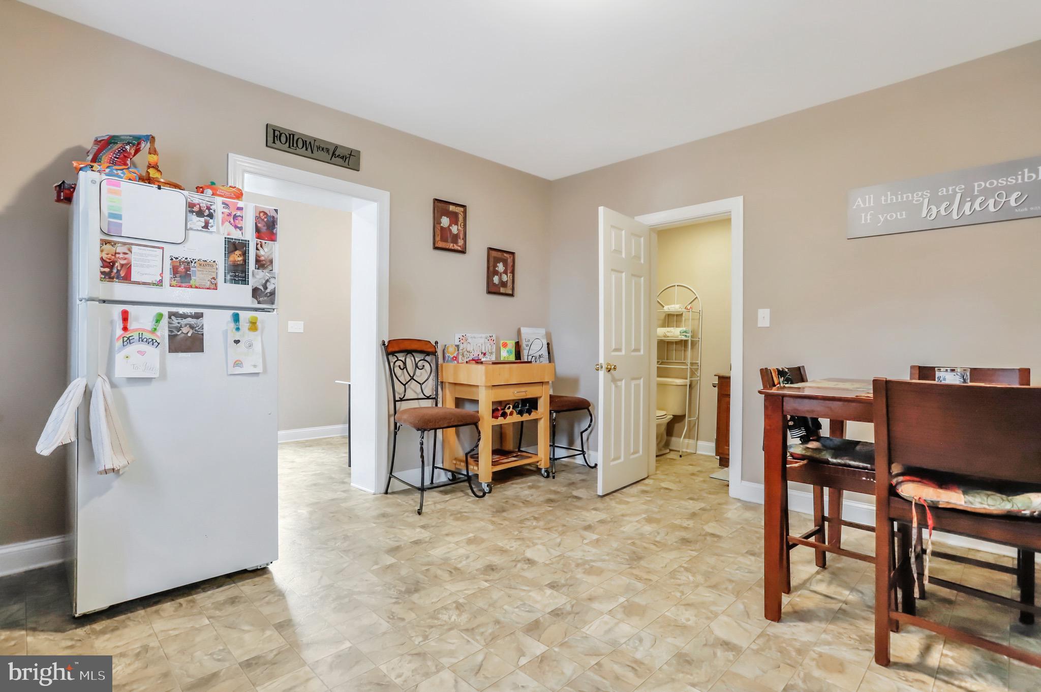3228 Gapland Road Rohrersville, MD 21779 - Photo 34 of 56 Table Space and Half Bathroom Off Kitchen