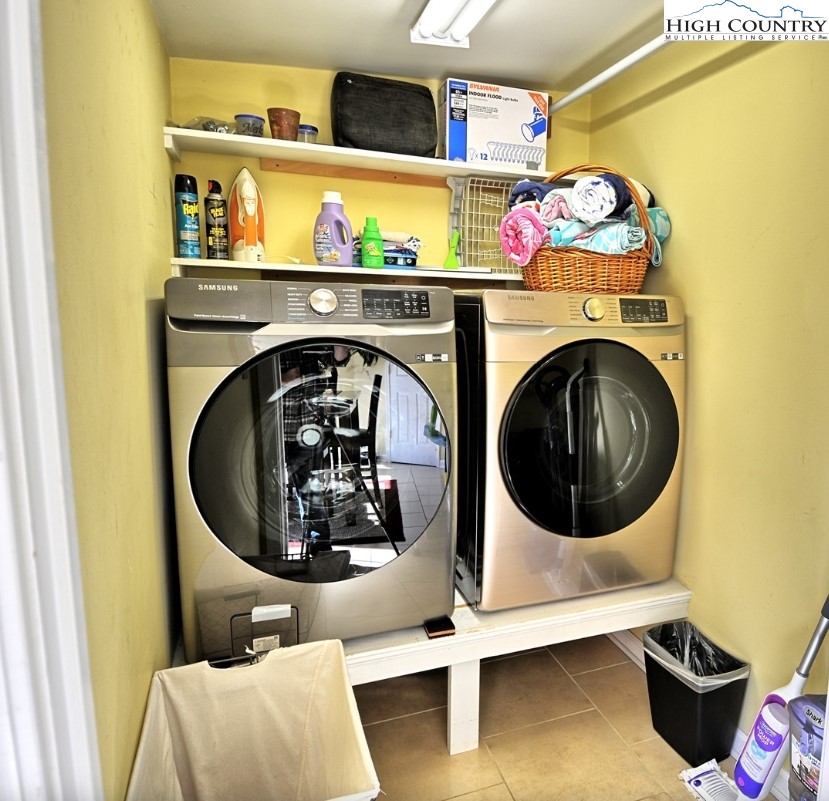 154 Beau Rivage Drive Crumpler, NC 28617 - Photo 27 of 34 a utility room with dryer and washer