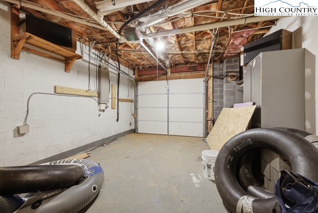 154 Beau Rivage Drive Crumpler, NC 28617 - Photo 29 of 34 a view of a room with racks and dryer
