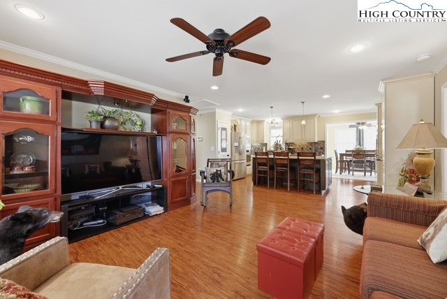 154 Beau Rivage Drive Crumpler, NC 28617 - Photo 6 of 34 a living room with furniture and a flat screen tv