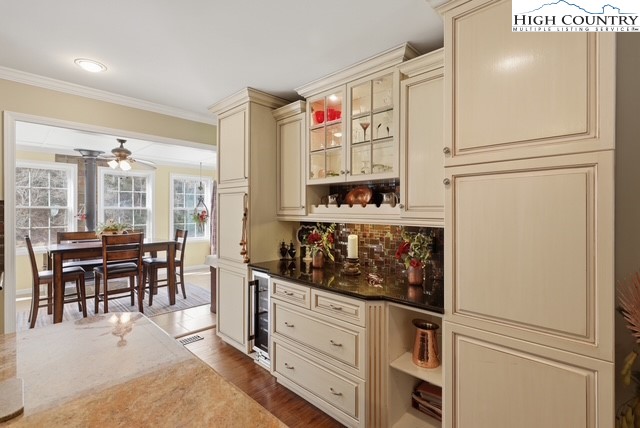 154 Beau Rivage Drive Crumpler, NC 28617 - Photo 9 of 34 a kitchen with stainless steel appliances granite countertop a refrigerator and a dining table