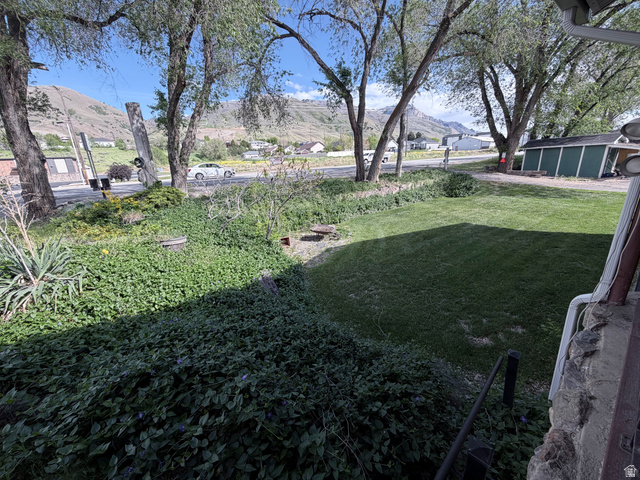 2855 South 1000 West Perry, UT 84302 - Photo 119 of 142 View of grassy yard featuring a mountain view
