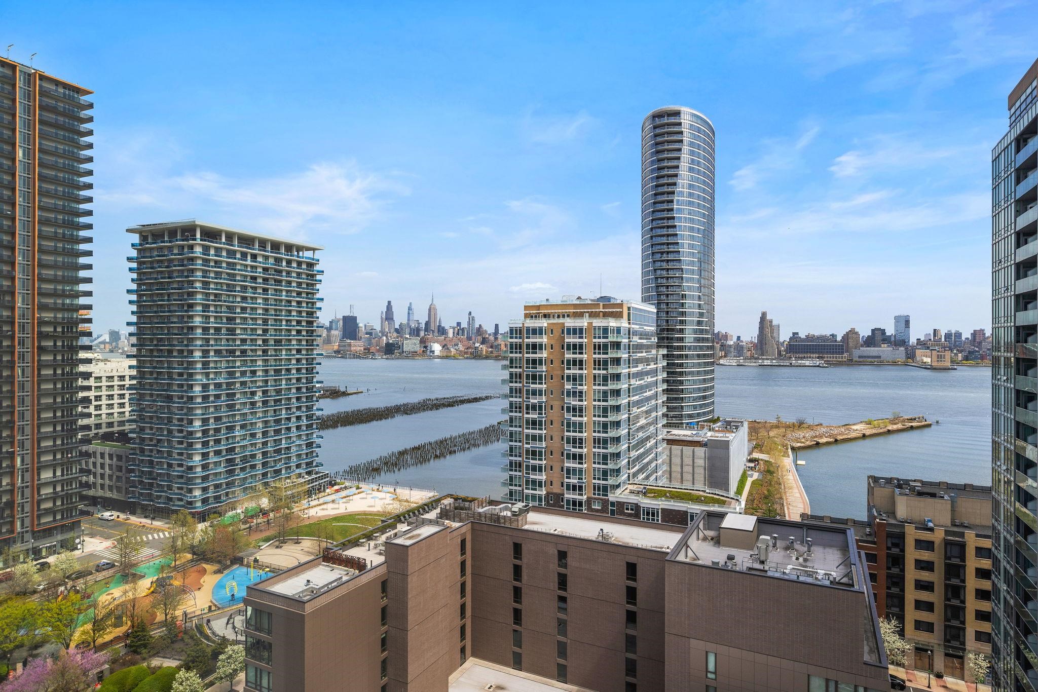 75 Park Lane South, Unit 1607 Jersey City, NJ 07310 - Photo 13 of 20 a view of a city with tall buildings
